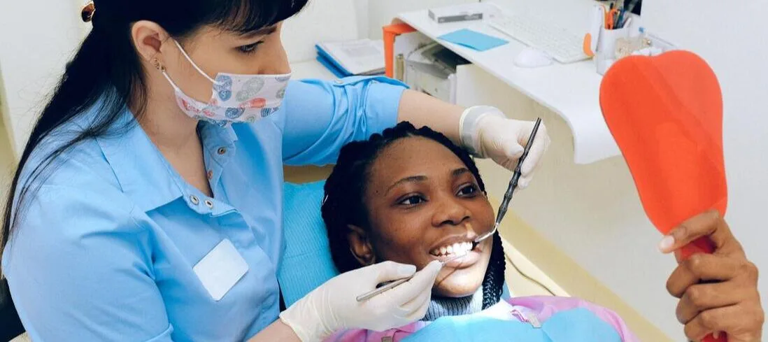 Patient and dentist in dental office